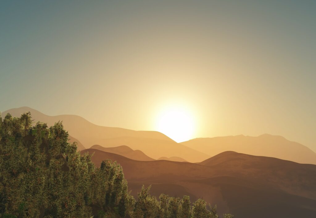 sunrise over mountains and trees